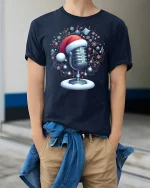 Christmas Microphone Santa Hat Musical Holiday Magic Tee - model wearing navy tee with hands in pockets