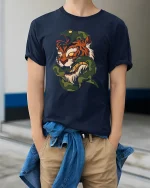 Fierce Tiger and Snake Battle Bold Warrior Graphic Art Tee - model wearing navy tee with hands in pockets