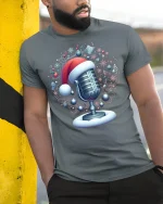 Christmas Microphone Santa Hat Musical Holiday Magic Tee - model wearing grey tee, leaning on column