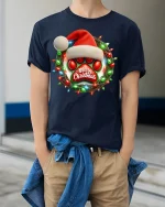 Christmas Paw Print Tee with Santa Hat and Festive Light Wreath - model wearing navy tee with hands in pockets