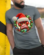 Christmas Paw Print Tee with Santa Hat and Festive Light Wreath - model wearing grey tee, leaning on column