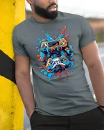 Gamer Splash Tee with Colorful Controller Art and Cool Style - model wearing grey tee, leaning on column