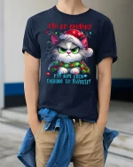 Funny Grumpy Cat Tee with Holiday Humor and Cute Angry Style - model wearing navy tee with hands in pockets