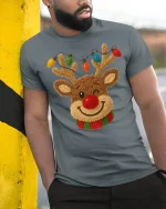 Cute Reindeer Tee with Colorful Christmas Lights and Cozy Charm - model wearing grey tee, leaning on column