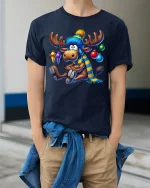 Funny Christmas Moose Tee Winter Hat Scarf Festive Ornaments - model wearing navy tee with hands in pockets