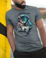 Retro Gamer Cat Tee with Headphones and Neon Controller Art - model wearing grey tee, leaning on column