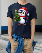 Cute Christmas Penguin Tee With Cozy Holiday Cheer - model wearing navy tee with hands in pockets