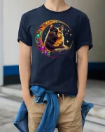 Mystic Moon Cat Tee With Cosmic Glow And Magical Vibes - model wearing navy tee with hands in pockets