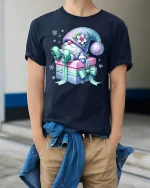 Cute Gift Box Gnome Graphic Tee With Cozy Winter Fantasy Art - model wearing navy tee with hands in pockets