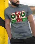 Joyful Christmas Reindeer Graphic Tee With Festive Holiday Charm - model wearing grey tee, leaning on column