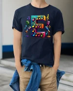 Colorful Letter E Music Notes Microphone Graphic Tshirt Art - model wearing navy tee with hands in pockets
