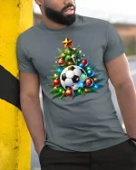 Festive Soccer Ball Christmas Tree Holiday Sports Graphic Tshirt - model wearing grey tee, leaning on column