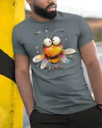 Cute Funny Bumblebee Big Eyes Cartoon Love Graphic Tshirt Art - model wearing grey tee, leaning on column