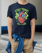 Stay Toxic Mutant Heart Cartoon Street Art Graphic T Shirt - model wearing navy tee with hands in pockets