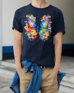 Colorful Butterfly Floral Art Graphic T Shirt Elegant Nature Style - model wearing navy tee with hands in pockets