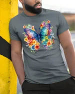 Colorful Butterfly Floral Art Graphic T Shirt Elegant Nature Style - model wearing grey tee, leaning on column