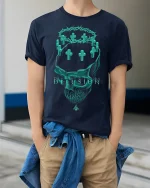 Delusion Crown Skull Graphic Tshirt Dark Gothic Art Design - model wearing navy tee with hands in pockets
