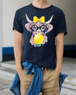Cute Colorful Highland Cow Bubble Gum Graphic T Shirt Fun Art - model wearing navy tee with hands in pockets
