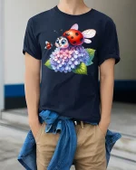 Cute Ladybug On Hydrangea Flowers Cartoon Art Graphic Tee Shirt - model wearing navy tee with hands in pockets