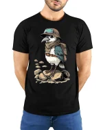 Adventurous Explorer Bird Cartoon Vintage Travel Graphic T Shirt - model wearing black tee with hands behind back