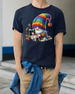 Cute Sewing Gnome Graphic T Shirt Cozy Crafty Art - model wearing navy tee with hands in pockets