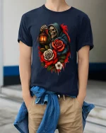 Gothic Reaper Rose Lantern Skull Art Graphic Tshirt - model wearing navy tee with hands in pockets