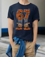 67 Basketball Drip Graphic Tee Bold Court Legend Style Tshirt - model wearing navy tee with hands in pockets