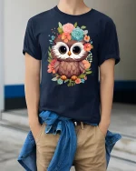Cute Floral Owl Big Eyes Whimsical Art Graphic Tshirt - model wearing navy tee with hands in pockets