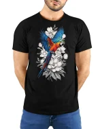 Vibrant Parrot Floral Art Nature Inspired Graphic Tshirt - model wearing black tee with hands behind back