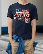 American Flag Motorcycle Illustration Graphic Tshirt Freedom Ride - model wearing navy tee with hands in pockets