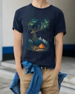 Majestic Stag Forest Camping Fantasy Illustration Graphic Tee - model wearing navy tee with hands in pockets