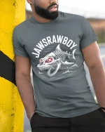 Jawsrawboy Skeleton Shark Horror Ocean Art Graphic Tee Tshirt - model wearing grey tee, leaning on column