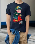 Angry Kid Riding Red Scooter Cartoon Art Graphic T Shirt - model wearing navy tee with hands in pockets