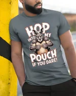 Hop Into My Pouch T Shirt Funny Kangaroo Graphic - model wearing grey tee, leaning on column