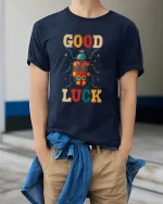 Good Luck Beetle Graphic T Shirt - model wearing navy tee with hands in pockets