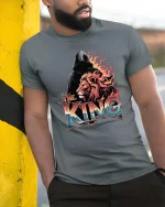 The King Lion Graphic T-Shirt Powerful Lion King Artwork Tee - model wearing grey tee, leaning on column