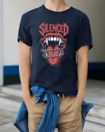Silenced Screaming Mouth Graphic T Shirt Dark Rebel Style Art - model wearing navy tee with hands in pockets