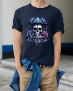 November Rain Skull Umbrella Gothic Rose Graphic T Shirt - model wearing navy tee with hands in pockets