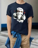 Believe Masked Street Rebel Urban Graphic T Shirt - model wearing navy tee with hands in pockets