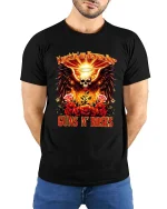 Angel Wing Skull Roses Rock Inspired Graphic T Shirt Design - model wearing black tee with hands behind back
