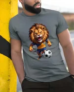 Fierce Soccer Lion Cartoon Graphic T Shirt Football Champion - model wearing grey tee, leaning on column