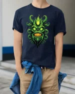 Green Eldritch Skull Monster Dark Horror Graphic T Shirt - model wearing navy tee with hands in pockets