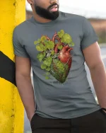 Human Heart With Nature Roots Leaves Graphic T Shirt Artistic Style - model wearing grey tee, leaning on column