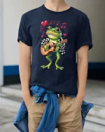 Adorable Frog Guitar Player Cartoon Graphic T Shirt Fun Style - model wearing navy tee with hands in pockets