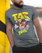 Taz Brooklyn Cartoon Chaos Graphic T Shirt Street Style - model wearing grey tee, leaning on column