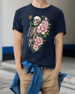Skull and Flowers Butterfly Dark Aesthetic Graphic Tee - model wearing navy tee with hands in pockets