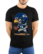 Fierce Eagle Football Player Cartoon Graphic T Shirt - model wearing black tee with hands behind back