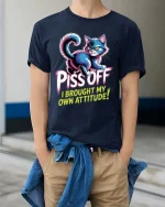 Piss Off I Brought My Own Attitude Funny Cat T Shirt - model wearing navy tee with hands in pockets
