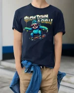 Slow Down and Chill Sloth Skateboard Funny Graphic T Shirt - model wearing navy tee with hands in pockets