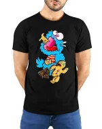 Crazy Blue Monster Cookie Candy Funny Graphic T Shirt Cartoon - model wearing black tee with hands behind back